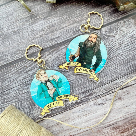 LAST ONE - Be Gay Do Crime Double-Sided Blackbeard and Stede Keychains